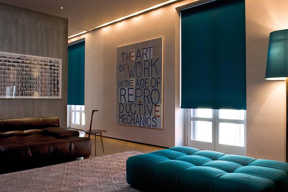 Roller shades in a bedroom